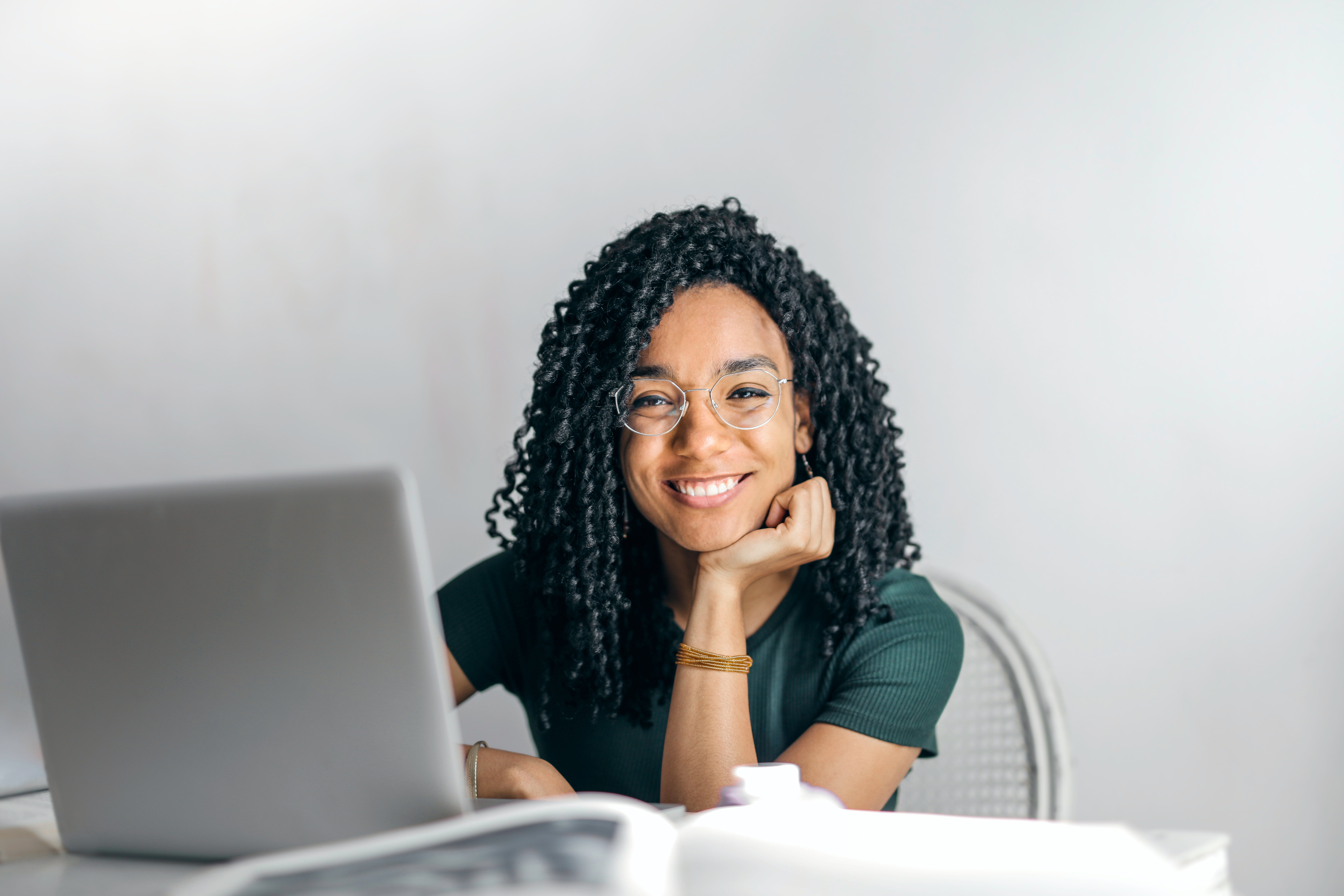woman on the phone at a computer