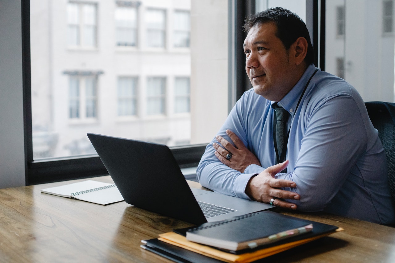 Man sitting in front of laptop