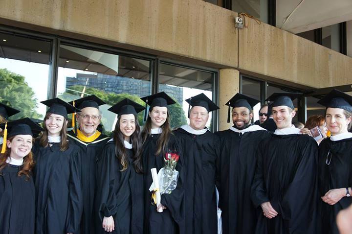 Men and Women in Caps and Gowns