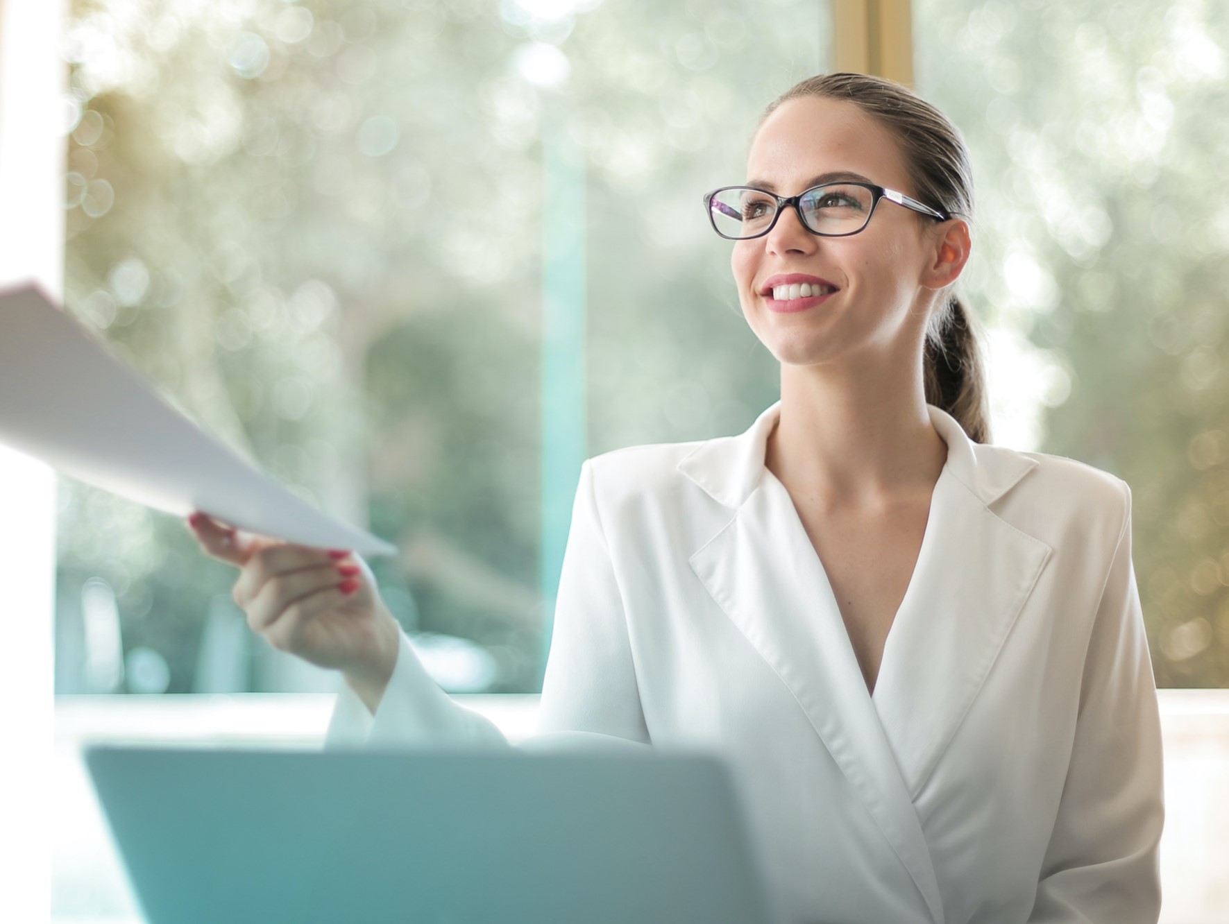 Professional woman reviewing papers